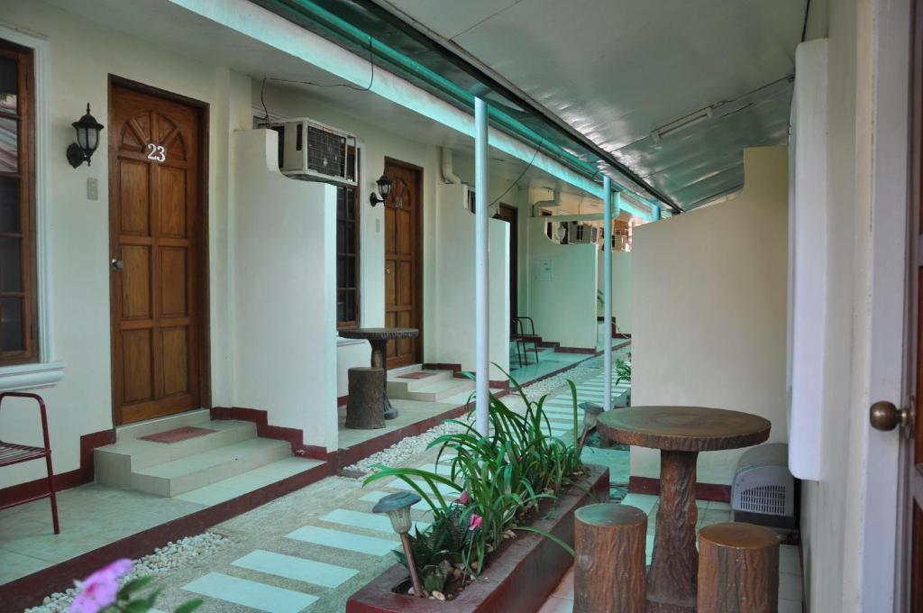 D'Lucky Garden Inn & Suites Tiniguiban Pokoj fotografie